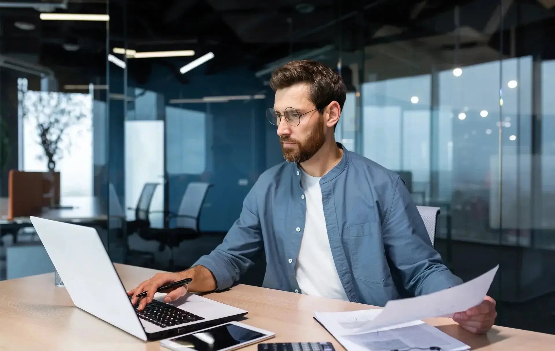 Man-reviewing-documents